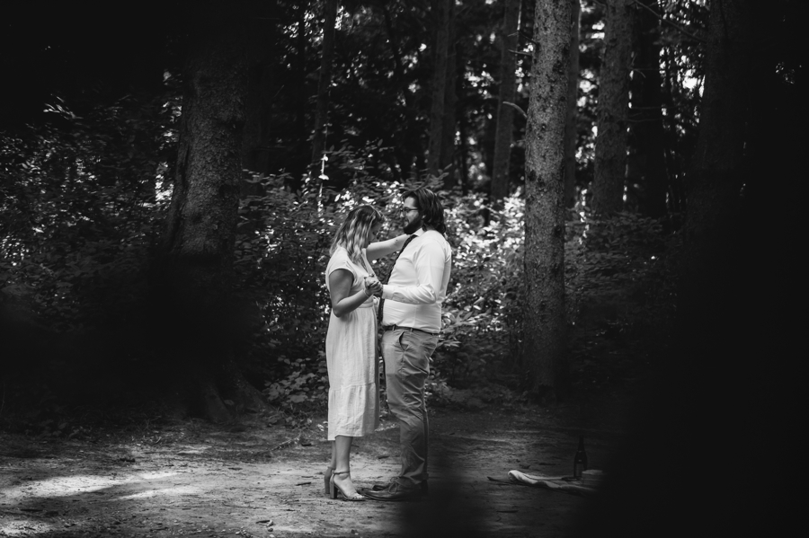 Dan and Melissa Dancing in the woods during their engagement session